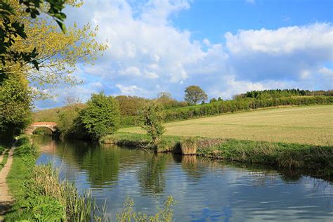 A Day in Newbury: Exploring the Town with CabCo 2 Peaceful view of the Kennet & Avon Canal near Newbury – a perfect spot for a riverside walk during your day out with CabCo.